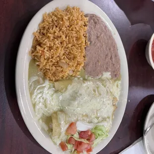 Shrimp enchiladas with green sauce on top - delicious!
