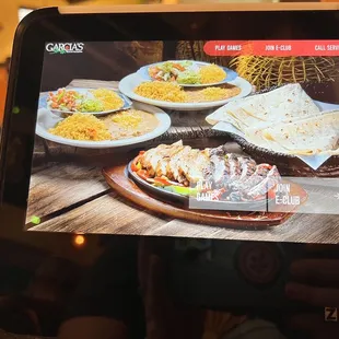 Ziosk to pay, join e-club, play games, or call server.