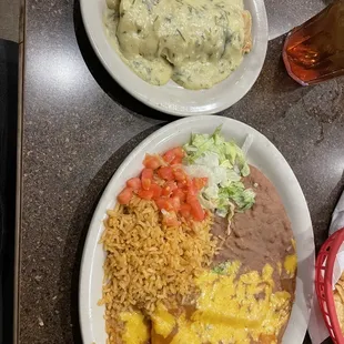 Cheese enchiladas and one of the chicken enchiladas with cilantro cream sauce