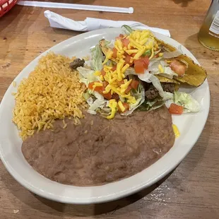 Two taco dinner. One beef, one chicken.  Also comes with beans and rice.