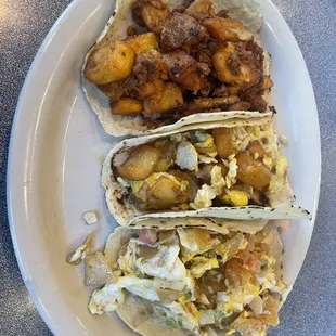 Potato and chorizo taco. Potato and egg. And migas taco.