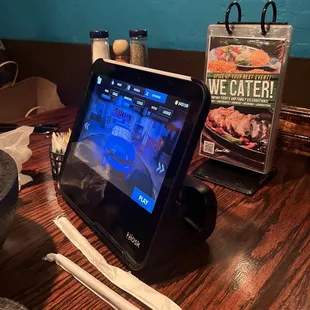 Tabletop kiosk to order and play games