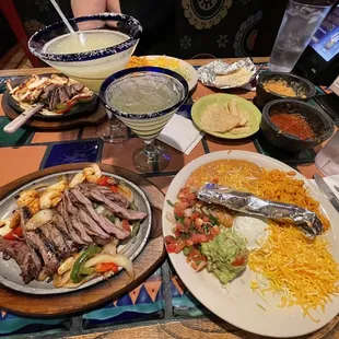 Steak and Shrimp fajitas, with steak and chicken fajitas.