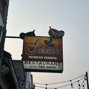 a sign for a mexican cuisine restaurant