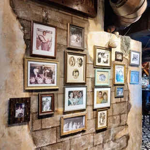 a wall of family photos