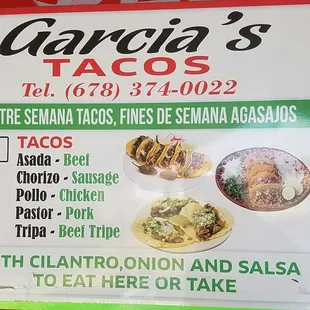 a menu on a food truck