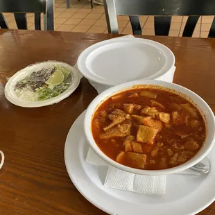Menudo with the spice add on in upper left corner