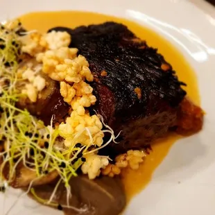 Braised Brisket, Smoked Eggplant, eggplant puree, crackling rice, sprouts, Ssamjang butter