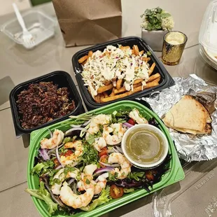 Pulled pork fries with bbq pulled pork on the side. And citrus shrimp salad