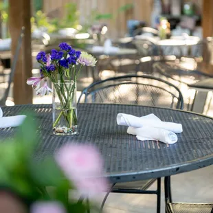 a table with a vase of flowers on it
