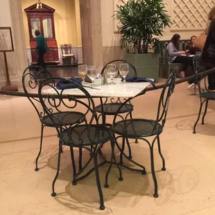 a table and chairs in a restaurant