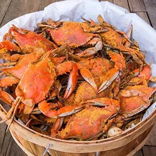 a basket full of steamed crabs