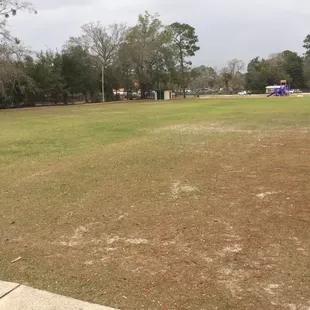 Huge field separating the two playgrounds.