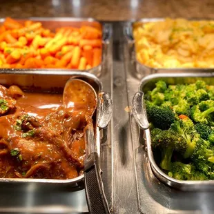 Pork chops, Mac n cheese, broccoli and mashed potatoes
