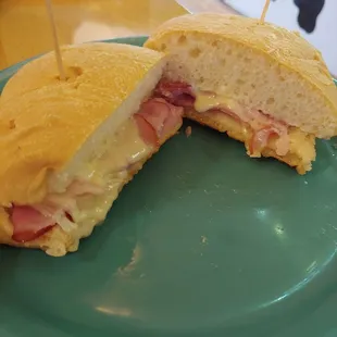 a ham and cheese sandwich cut in half