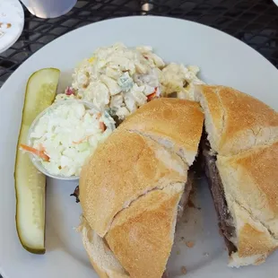 Roast Beef Sandwich with side of dipping sauce, cole slaw and macaroni salad