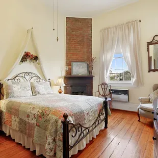 Rose Room with queen bed, ensuite bathroom with shower only and kitchenette (no stove) on 2nd floor.