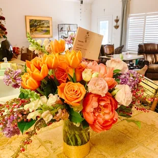 Beautiful &amp; bright arrangement with peonies, tulips, roses and more!