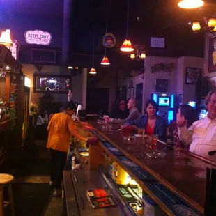 people sitting at the bar