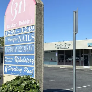 a sign in front of a restaurant