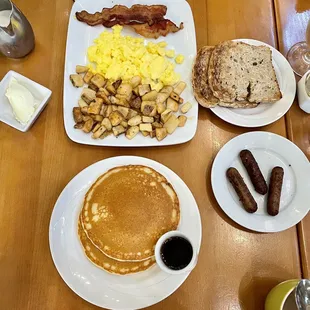 Fluffy Pancakes, scrambled eggs, bacon, vegan sausage &amp; multi grain toast