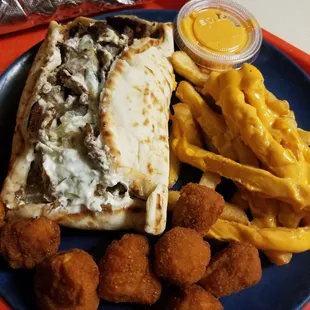 Gyro, cheese fries, and fried mushrooms. Happy STUFFED belly!