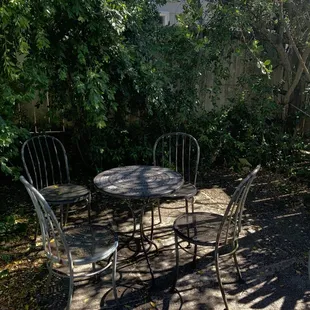 a table and chairs outside