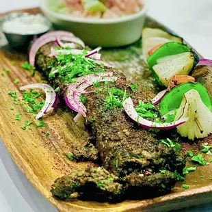 Scratch made, Herbaceous, Spicy Turkish Kabob Platter comes regular or spicy. AMAZBALLS! A must order. Cannot wait to have this again :)...