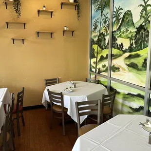 tables with white tablecloths