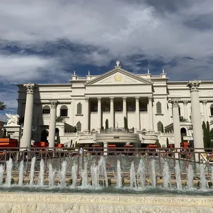a fountain and a building