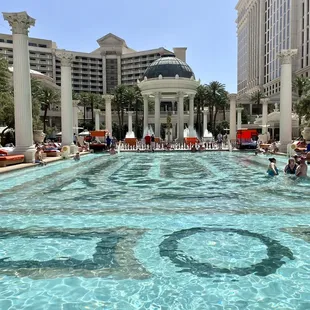 people relaxing in the pool