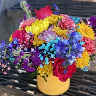 colorful daily arrangement with tinted baby's breath