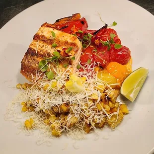 Grilled Jail Island Salmon | street corn, grilled baby peppers, cotija cheese, chipotle aioli [contains milk, fish]