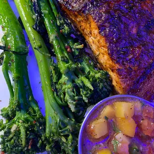 a plate of fish and vegetables