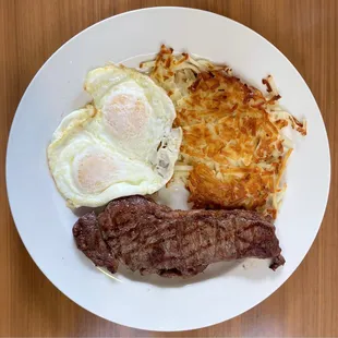 steak, eggs, hash browns and hash browns