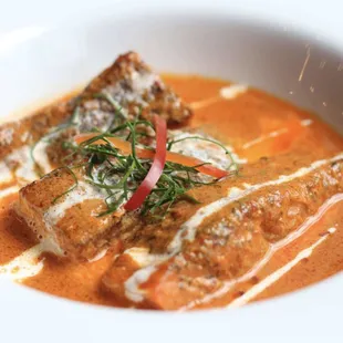 a close up of a bowl of soup