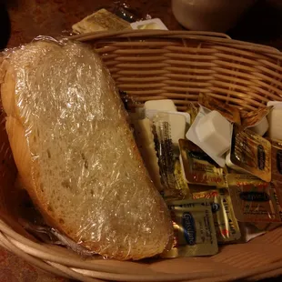 They plastic wrapped each individual slice of bread, which was stale, along with enough butter to feed a small country.