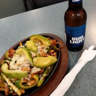Mexican food with a beer is very delicious