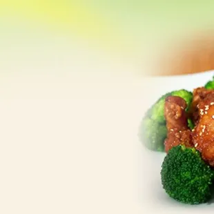 a plate of broccoli and chicken