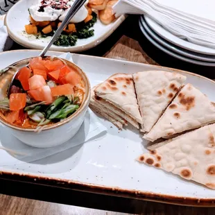 Creole Lobster Dip - Creole Seasoning, Topped With Shredded Parmesan, Diced Tomatoes, Scallions And Served With Grilled Pita Bread
