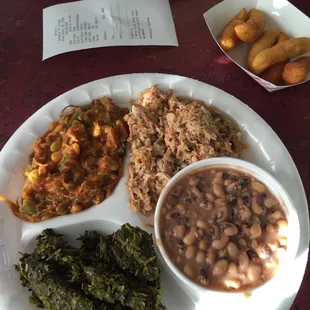 Great bbq pork with stew, collards and black eyed peas.