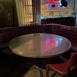 a table and chairs in a restaurant