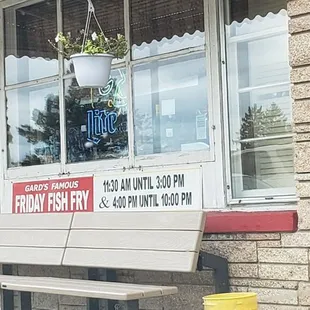 a bench in front of a store