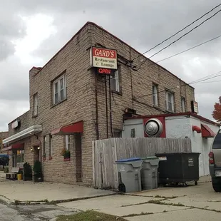 a car parked in front of a restaurant