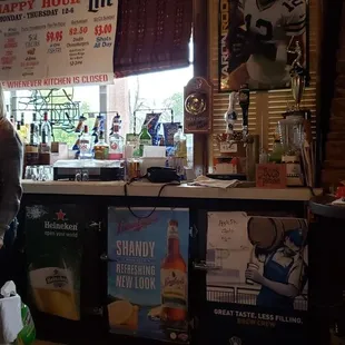 a man standing at a bar