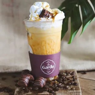 a cup of coffee with whipped cream
