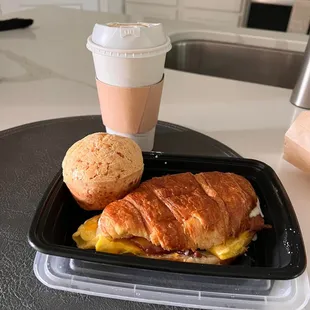 look at the size of that Brazilian cheese bread and croissant breakfast sandwich!
