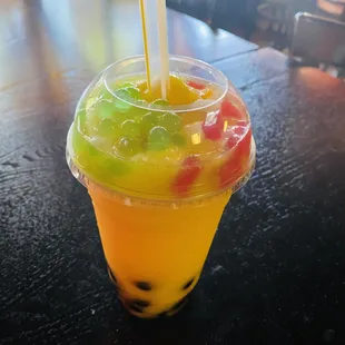 Fresh mango slush boba with tapioca ball mix coconut jelly and fruity boba