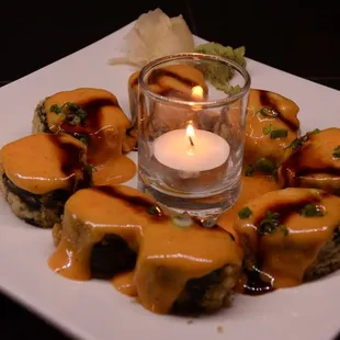 fuji volcano  spicy tuna cream cheese asparagus avocado deep fry top with volcano sauce