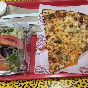 Sausage slice and a side salad